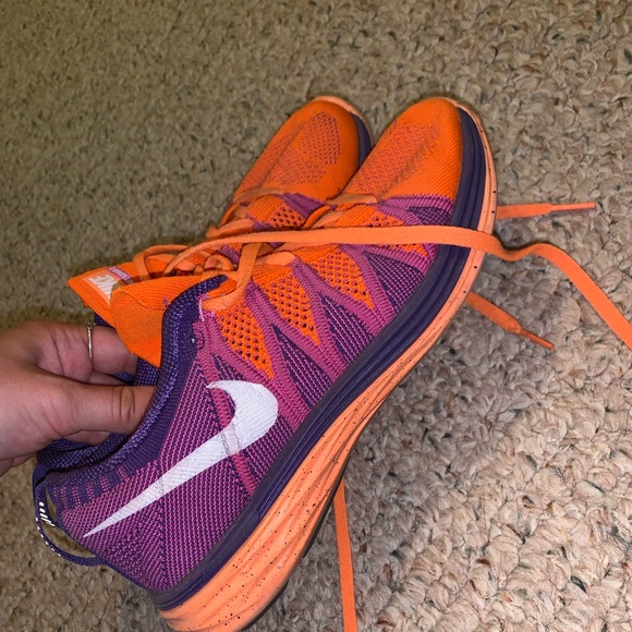 orange and purple tennis shoes